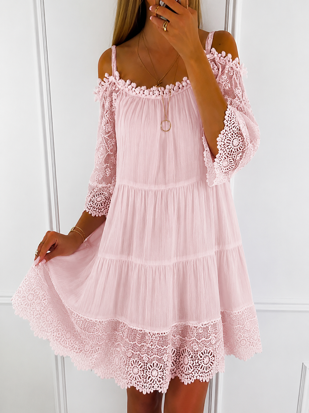Fashionable short women's cold shoulder summer dress. A versatile mini for casual or dressy looks.