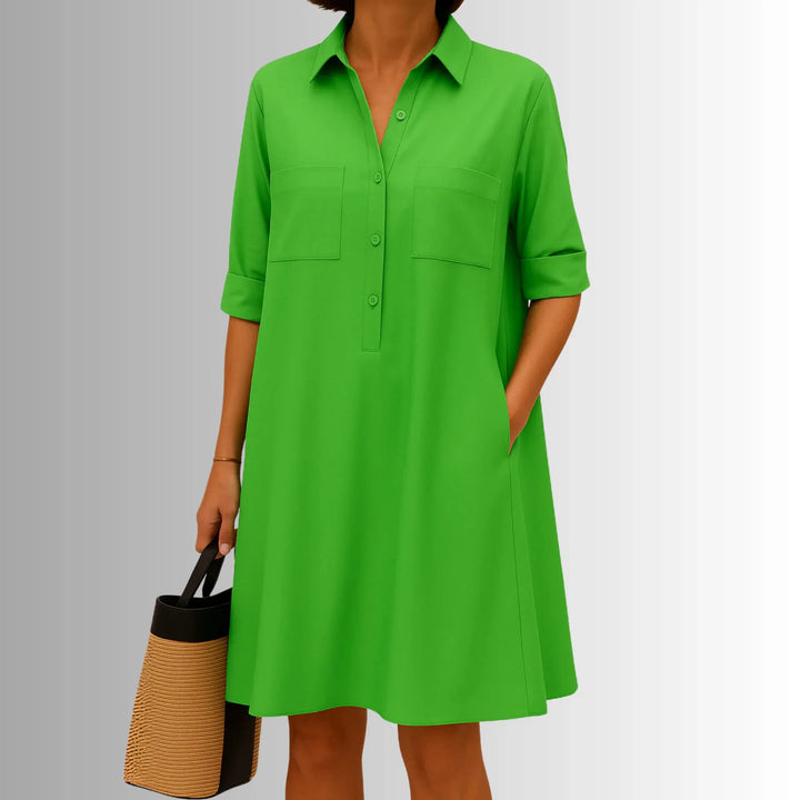 Chic women's collared shirt mini dress with 3/4 sleeves. Versatile A-line design, perfect for casual summer days.