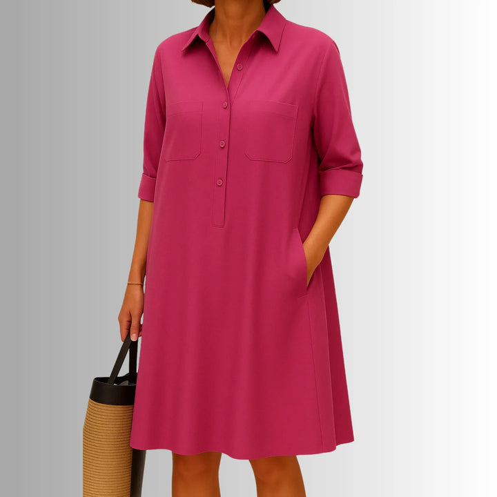 Fashionable women's collared shirt mini dress with 3/4 sleeves. A chic summer or casual day dress.