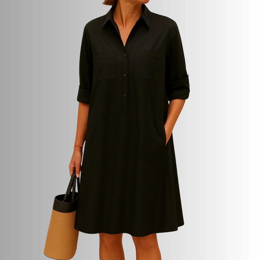 A-line women's collared shirt mini dress. Features 3/4 sleeves, ideal as a chic, casual summer dress.