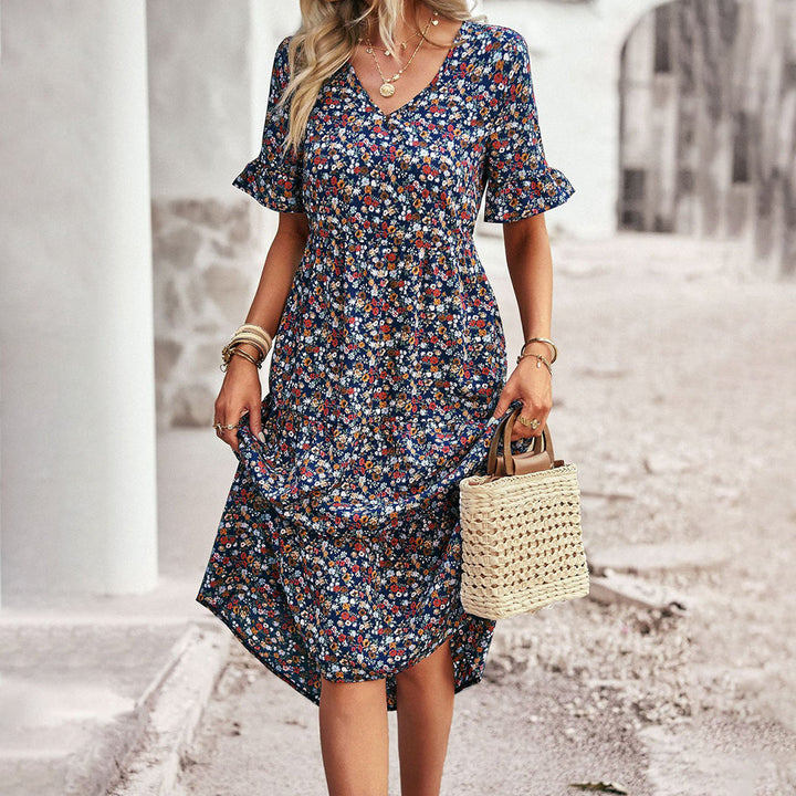 Versatile floral sleeveless midi dress for women, great for day wear, vacation, or an elegant summer look.