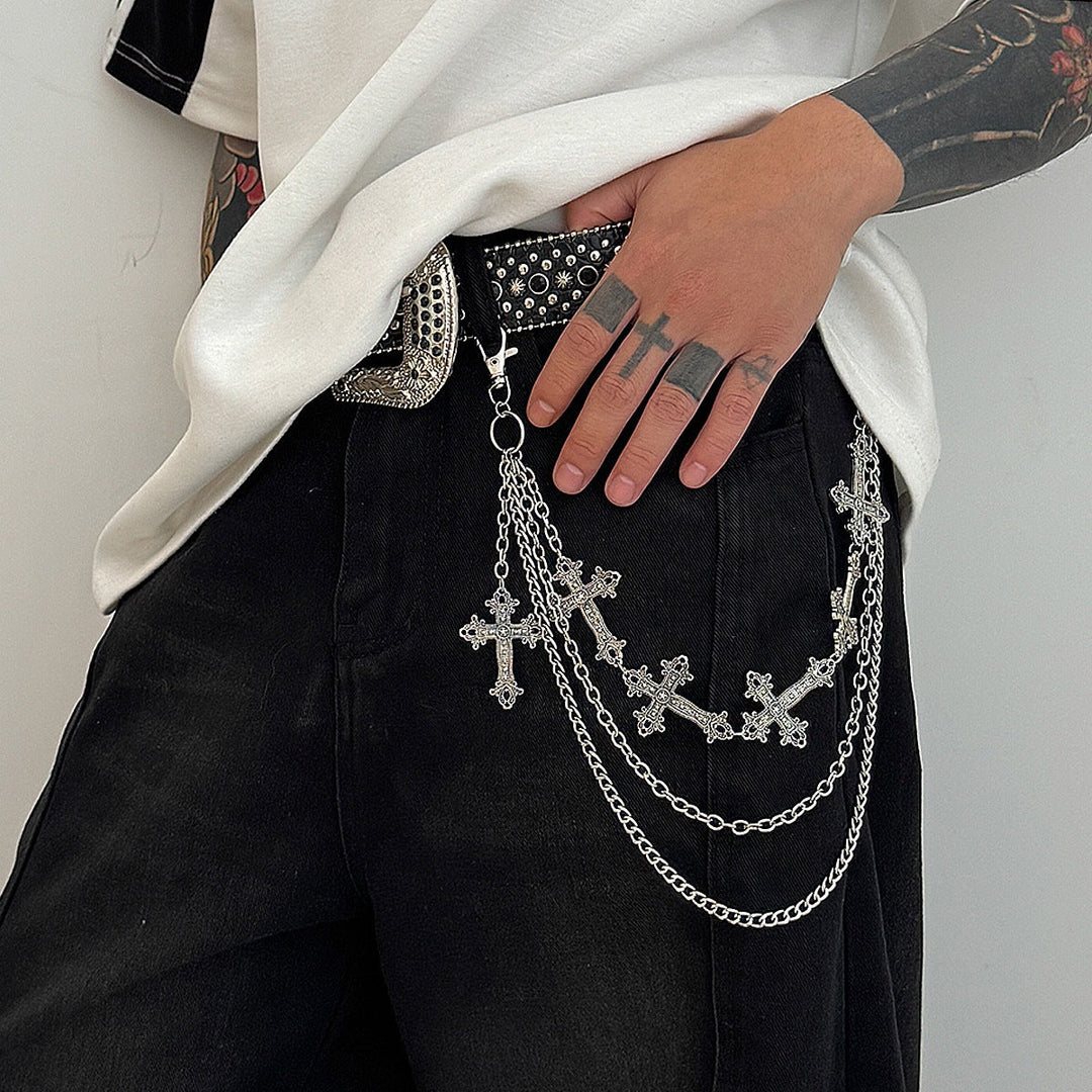 Chic women's gold chain belt with elegant cross pendants. Adjustable fashion accessory.