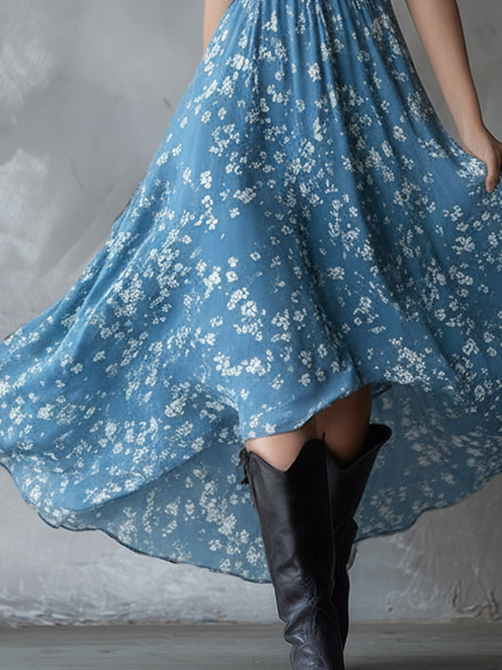 Chic women's party dress: floral print, halter neckline, ruched bodice, and a flowy asymmetrical skirt.