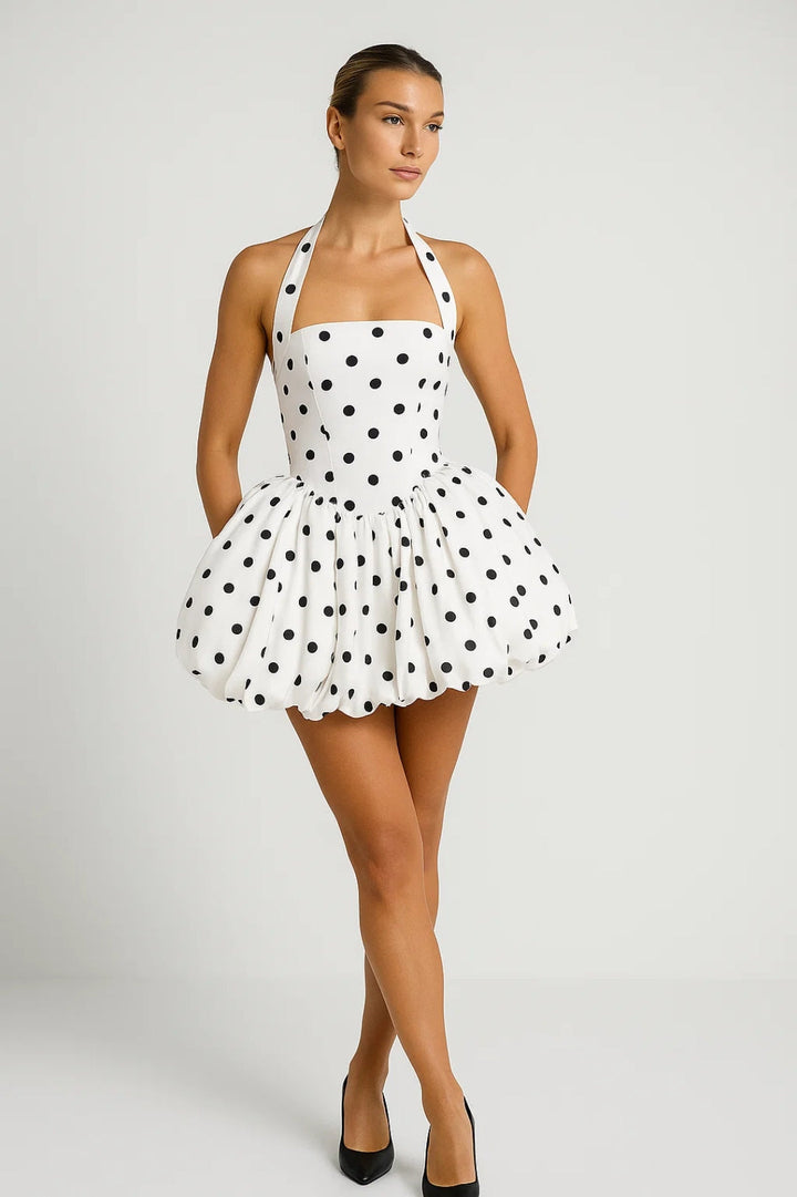 Chic women's halterneck mini dress with voluminous skirt, ideal for summer parties & elegant events.