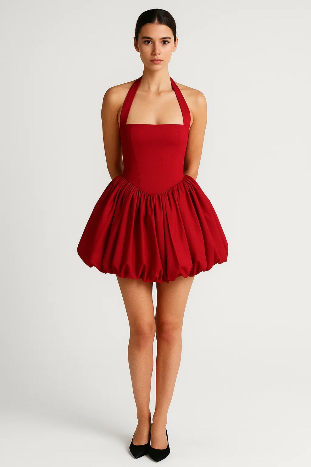 Fashionable women's mini dress with a unique halter neck design and an eye-catching voluminous skirt.