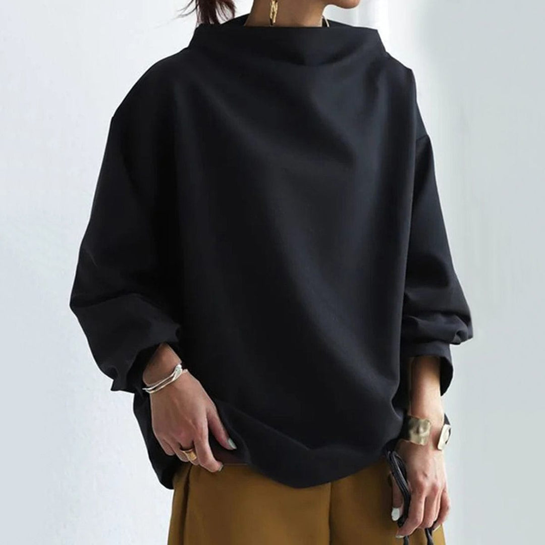 Modern women's long sleeve high-neck top. An elegant, chic, and versatile wardrobe essential for any occasion.