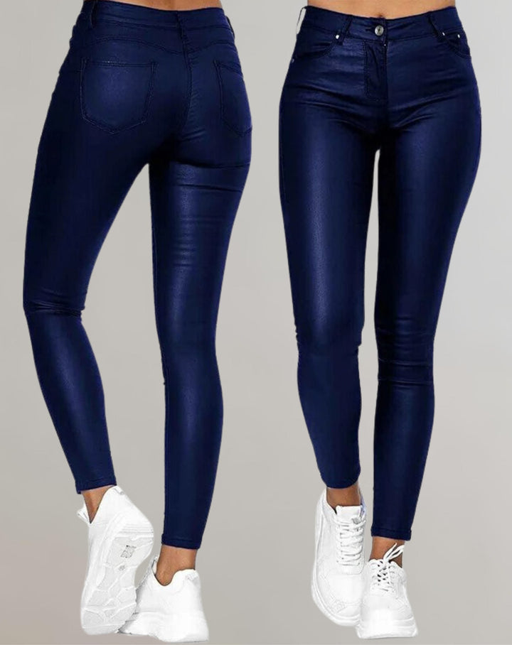 Fitted women's high waist skinny pants, ideal for a chic, modern look. Edgy and versatile fashion bottoms.