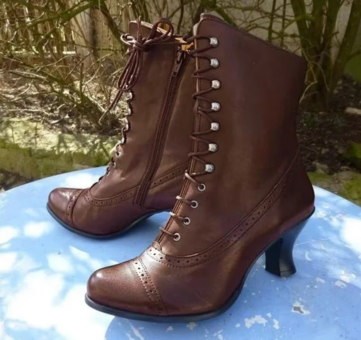 Chic women's lace-up platform ankle boots with a stylish pointed toe, perfect for fall fashion and winter outfits.