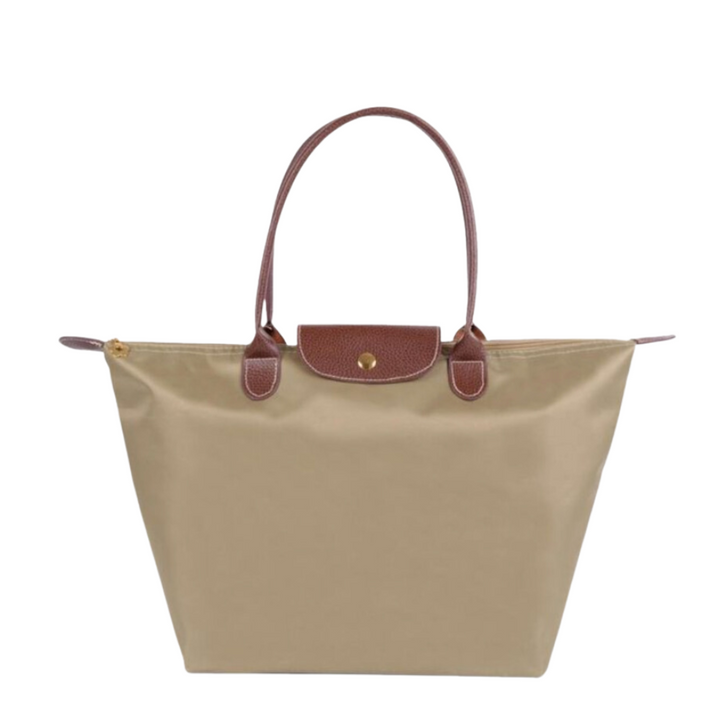 Spacious women's tote shoulder bag for daily use & travel. Chic, versatile, with secure closure fashion accessory.