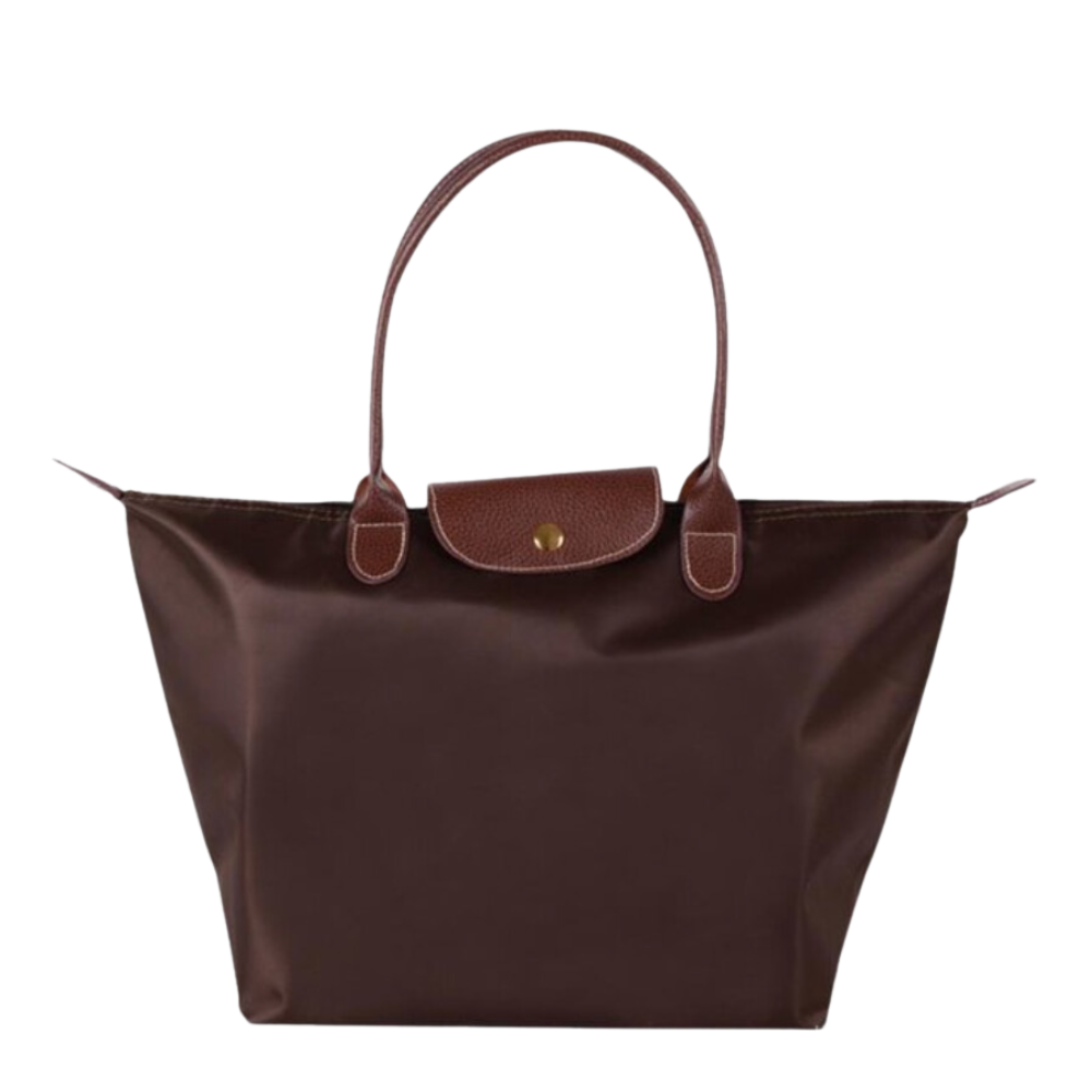 Stylish women's large shoulder tote bag, ideal for daily essentials. Elegant, spacious, versatile fashion accessory.