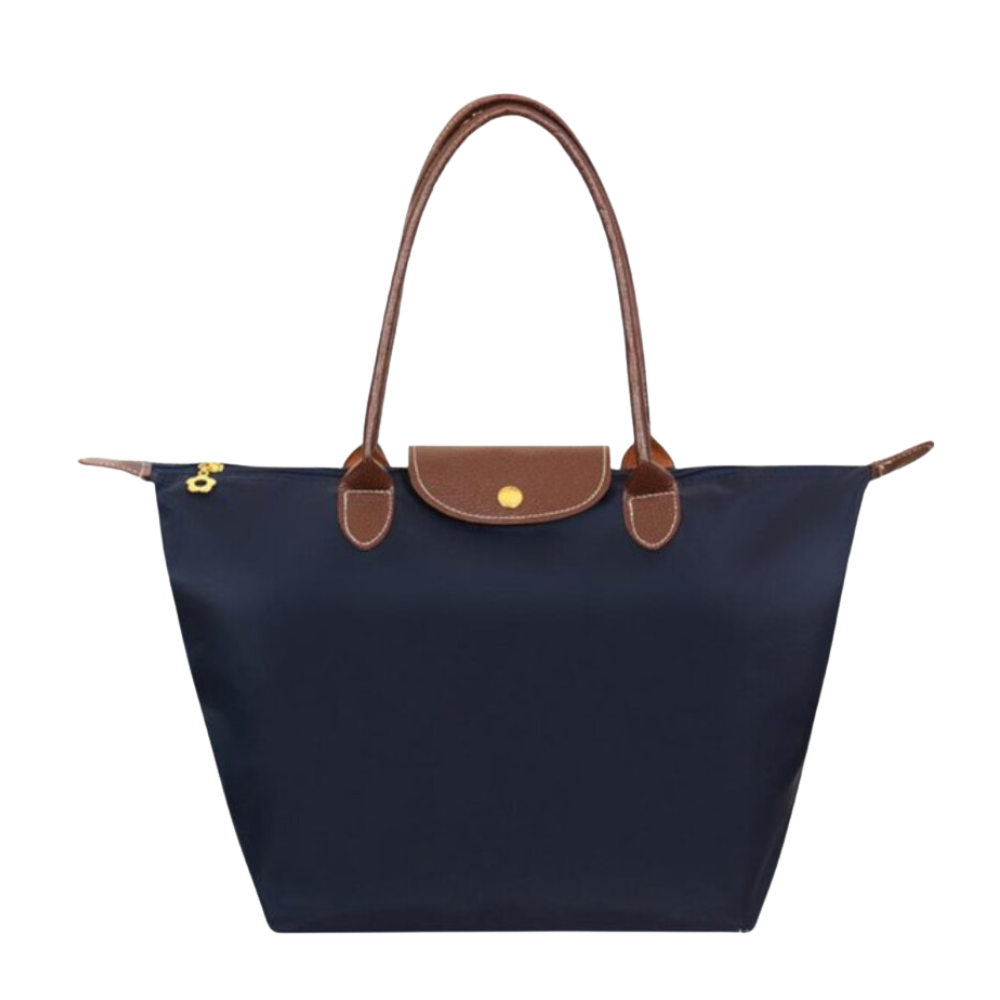 Woman carrying a stylish large capacity women's tote shoulder bag. Perfect everyday carry and fashion accessory.