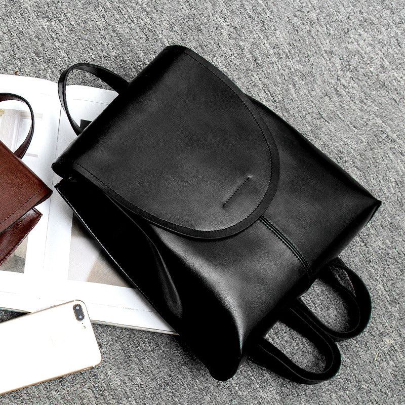 Premium genuine leather women's backpack, a durable & chic fashion accessory for daily needs.