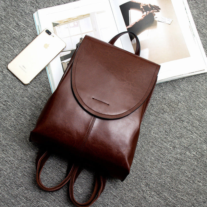 Spacious women's stylish leather backpack, ideal for travel, work or carrying daily essentials.