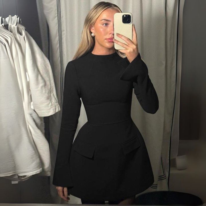Women's chic long sleeve bodycon mini dress. Modern, sleek, and fitted style, ideal for party or evening wear.