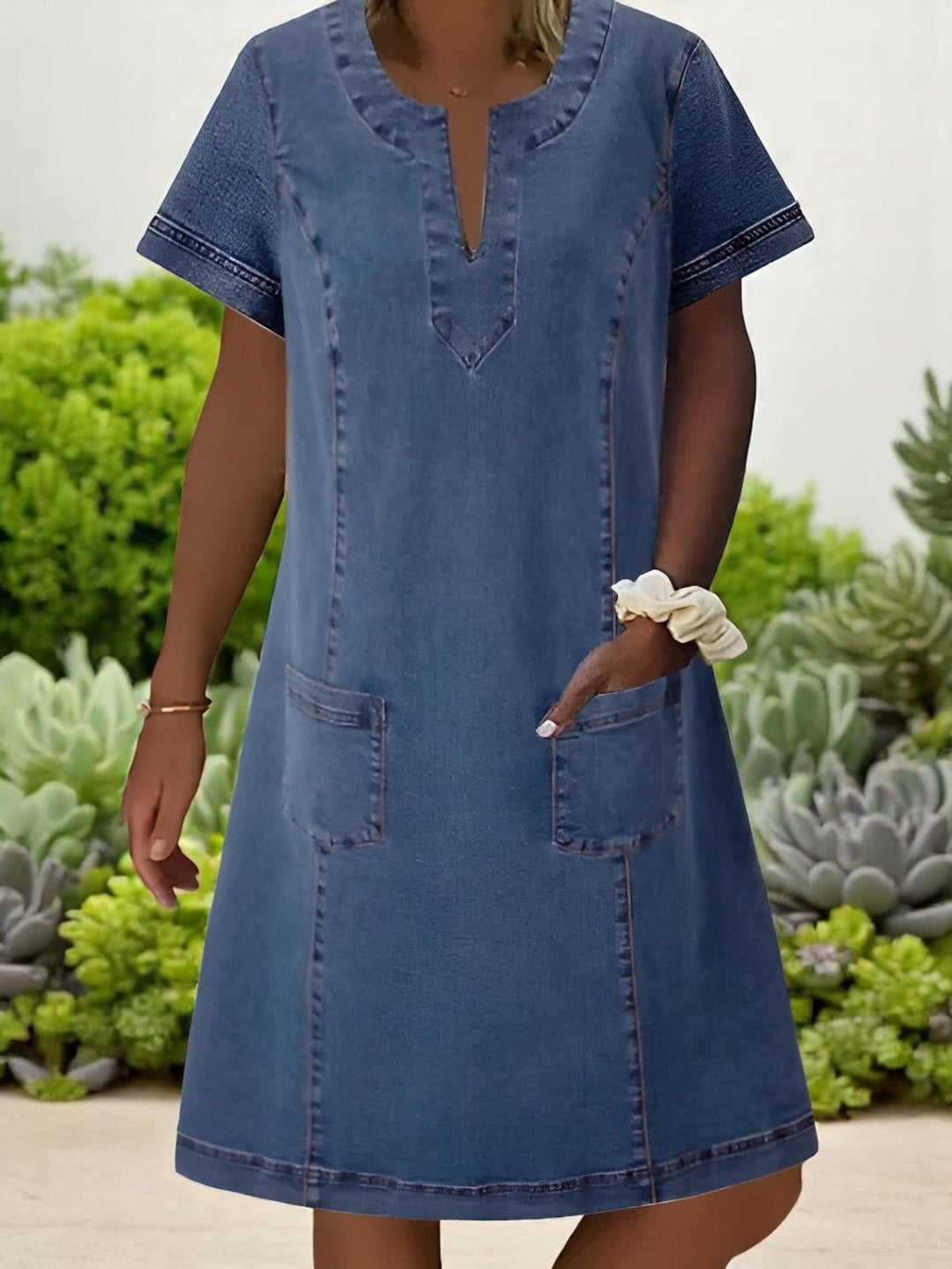 Chic women's midi dress for effortless style & comfort. Versatile for everyday wear, spring, or summer fashion.