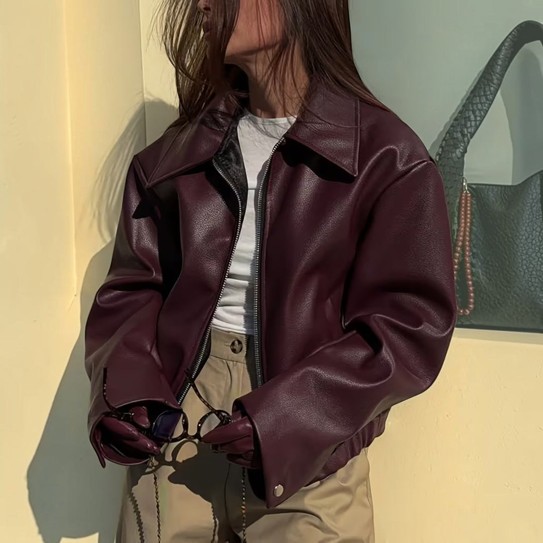 Chic women's moto jacket with a stylish lapel collar, perfect for versatile outerwear fashion.