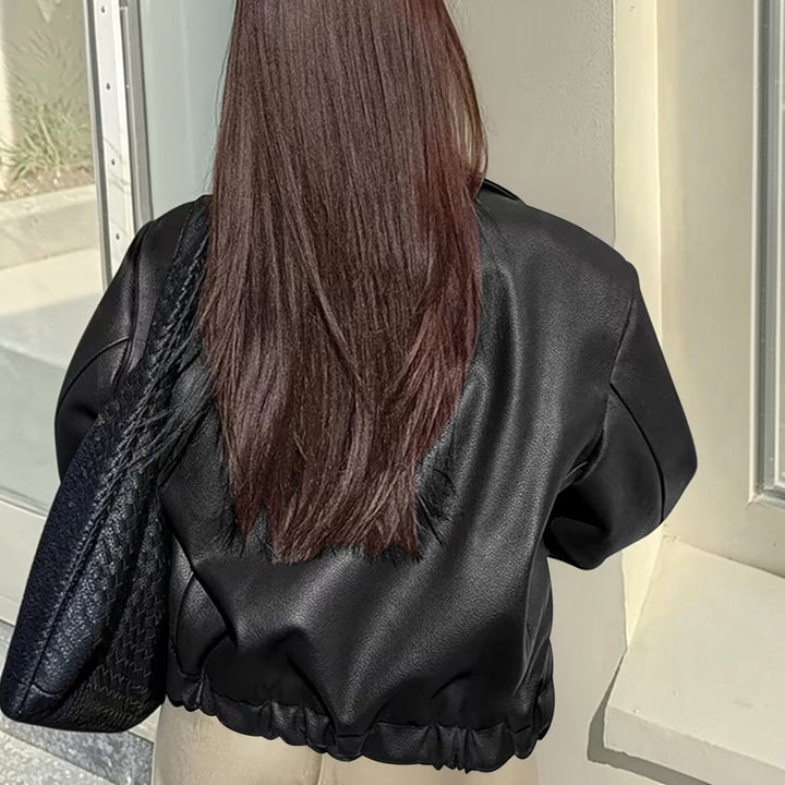 Sophisticated women's moto jacket with a stylish lapel collar, making it a versatile fashion staple.