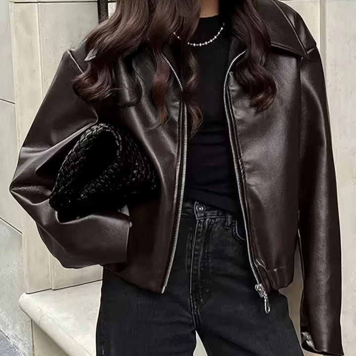 Essential women's fashion: a chic moto jacket with a bold lapel collar, perfect for versatile outfits.