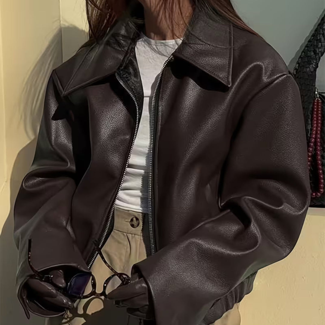 Comfortable & chic women's moto jacket with a classic lapel collar, ideal for casual and stylish looks.