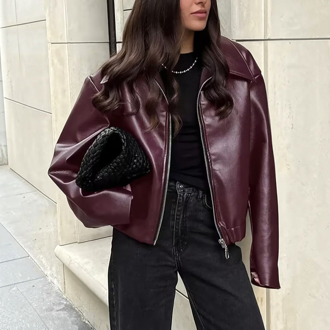 Trendy women's moto jacket featuring a classic lapel collar for chic, everyday style.