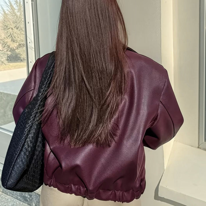Versatile women's jacket: a chic moto design with an elegant lapel collar, ideal for any season.