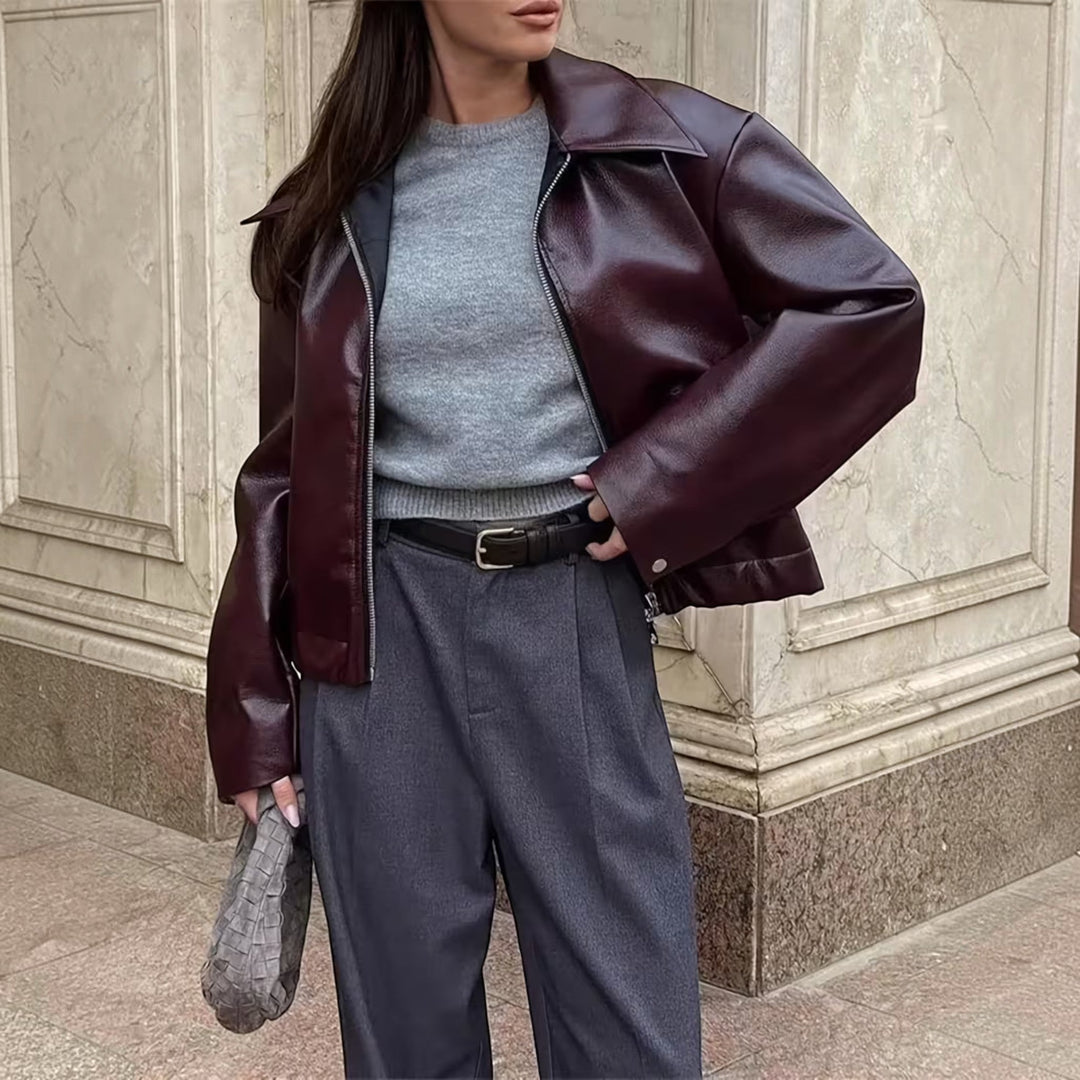 All-season women's outerwear: a chic moto jacket with a sophisticated lapel collar.