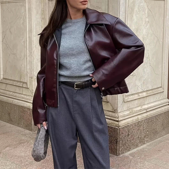 All-season women's outerwear: a chic moto jacket with a sophisticated lapel collar.