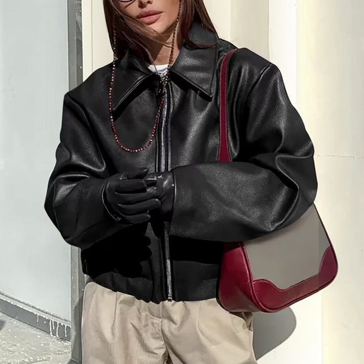 Fashionable women's moto jacket, sleek design, with a chic lapel collar for versatile styling.