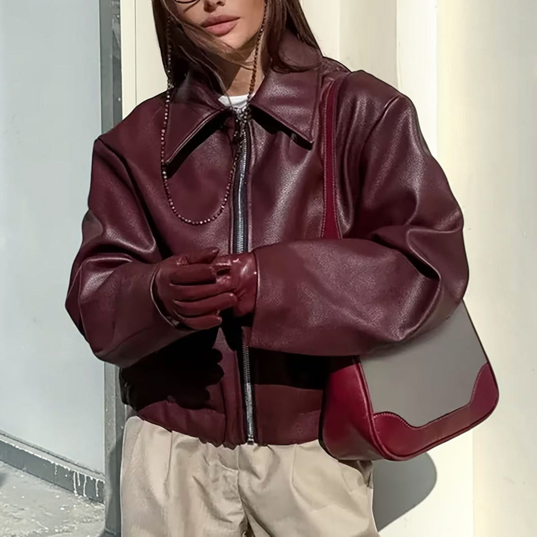 Elevate your look with this chic women's moto jacket, designed with a stylish lapel collar.