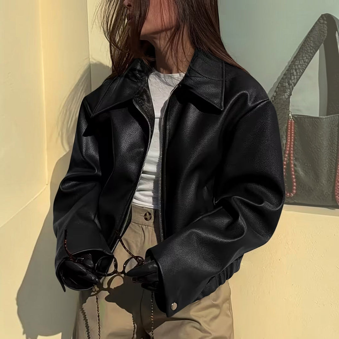 Modern women's lapel collar moto jacket, a versatile piece of chic outerwear for fashion-forward women.