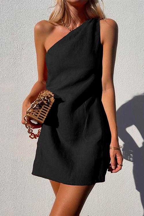 Elegant women's asymmetric mini dress. Ideal for casual wear, vacation, or a chic party look.