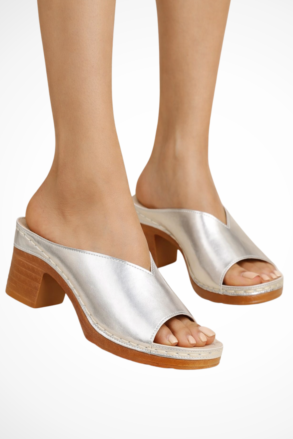 Elegant open toe block heel mules for women. Fashionable slip-on shoes, ideal for sophisticated summer events.