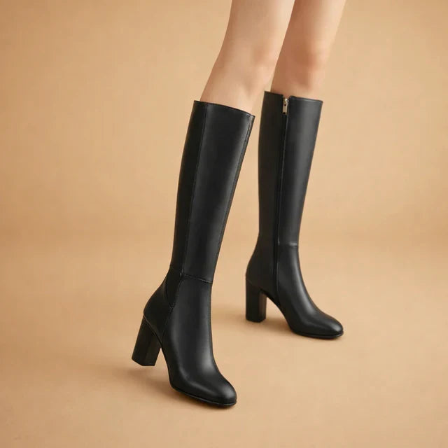 Women's fashionable over-the-knee high heel boots. Modern tall footwear, perfect for winter style.