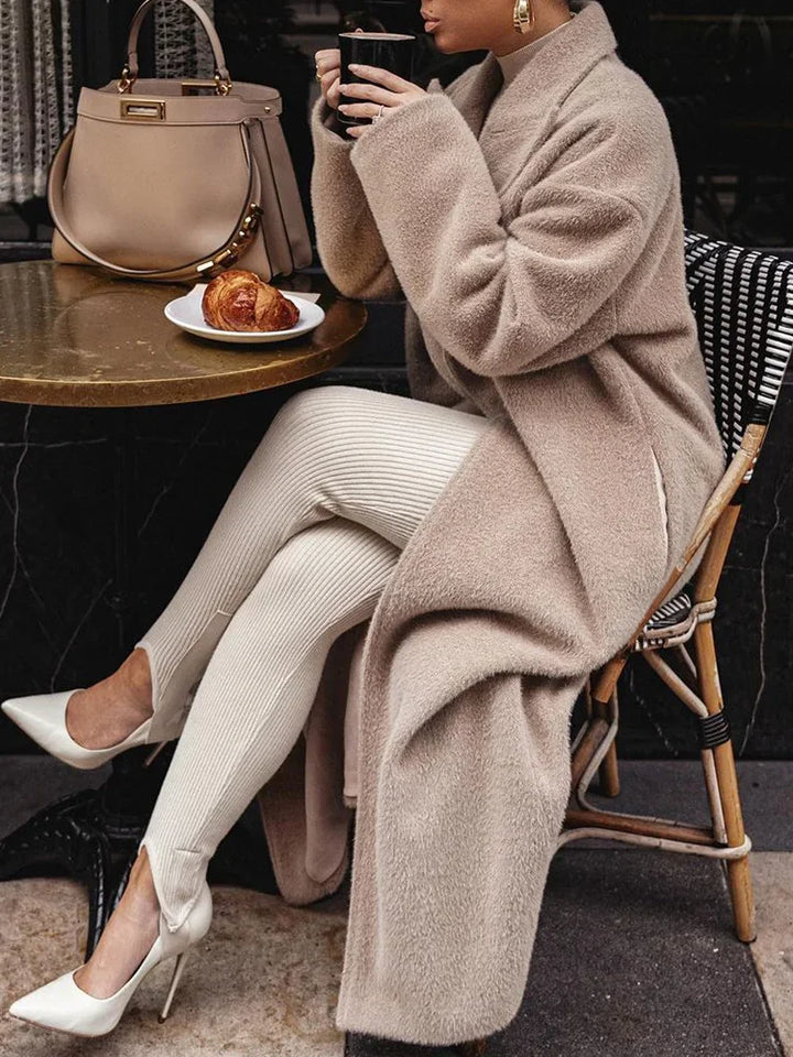 Stylish women's oversized button coat. Elegant lapel design, perfect for fall & winter outerwear.