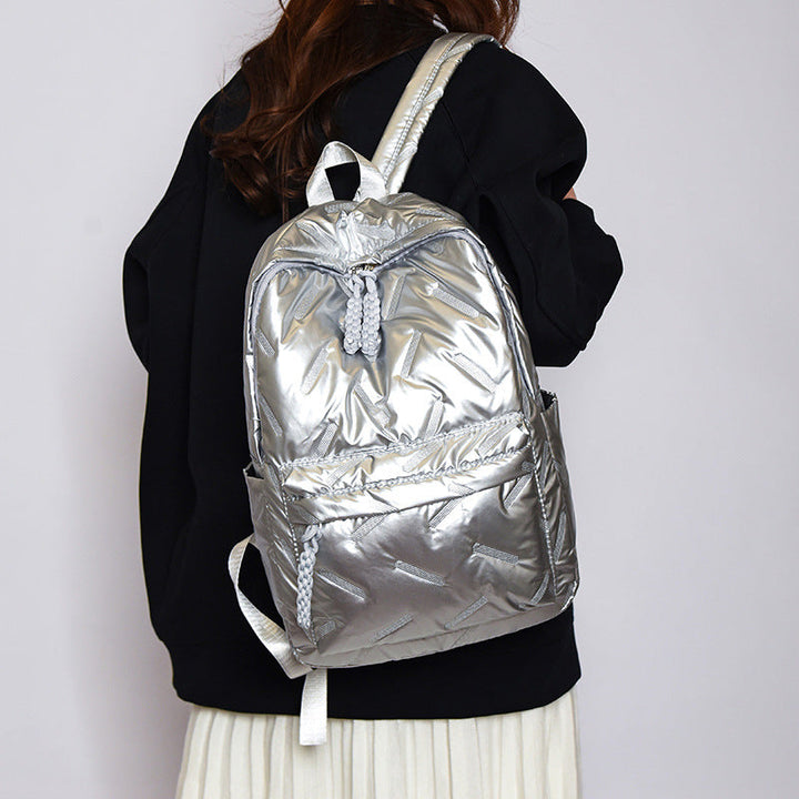 Versatile women's chic backpack, padded and spacious, perfect for travel, work, and daily errands.