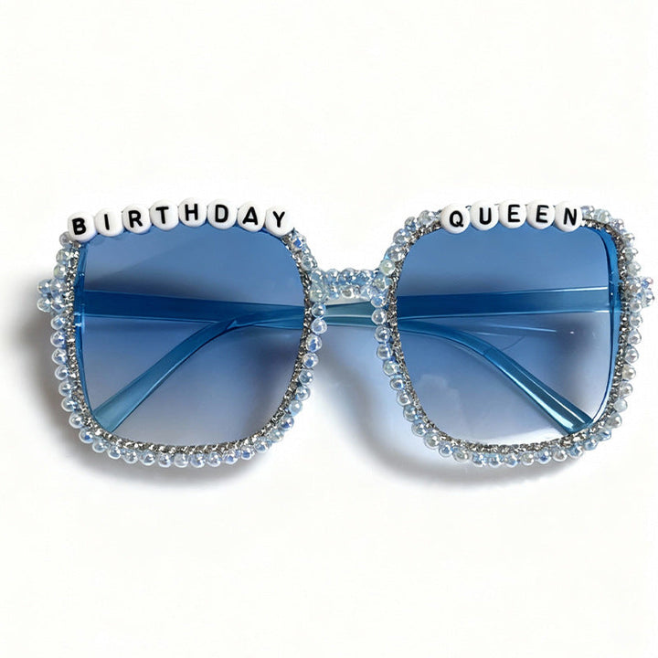 Fashionable women's square sunglasses with elegant pearl details; ultimate chic eyewear offering UV protection.