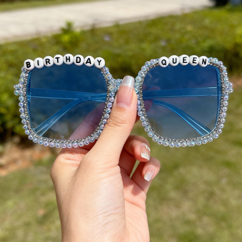 High-fashion women's square frame sunglasses with exquisite pearl embellishments; a statement for any outfit.