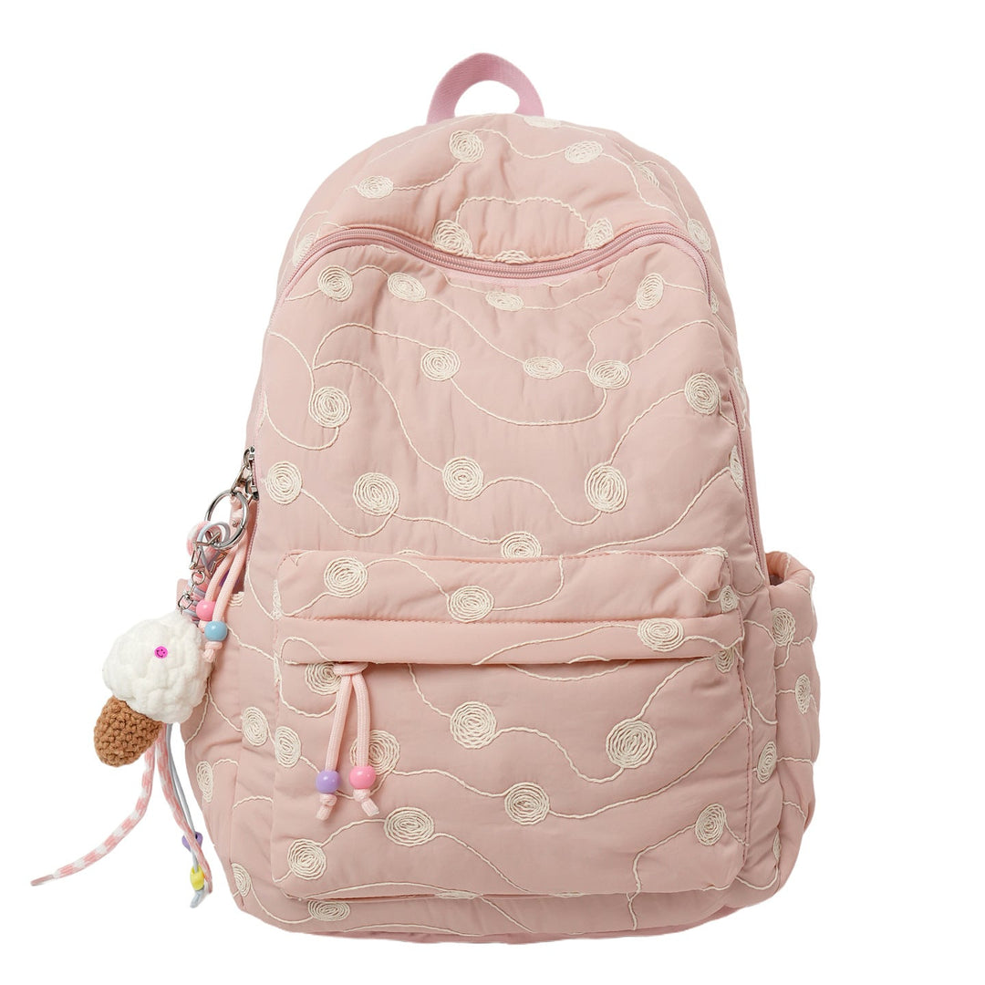 Chic women's quilted backpack with intricate embroidery, perfect for daily use & elegant style.
