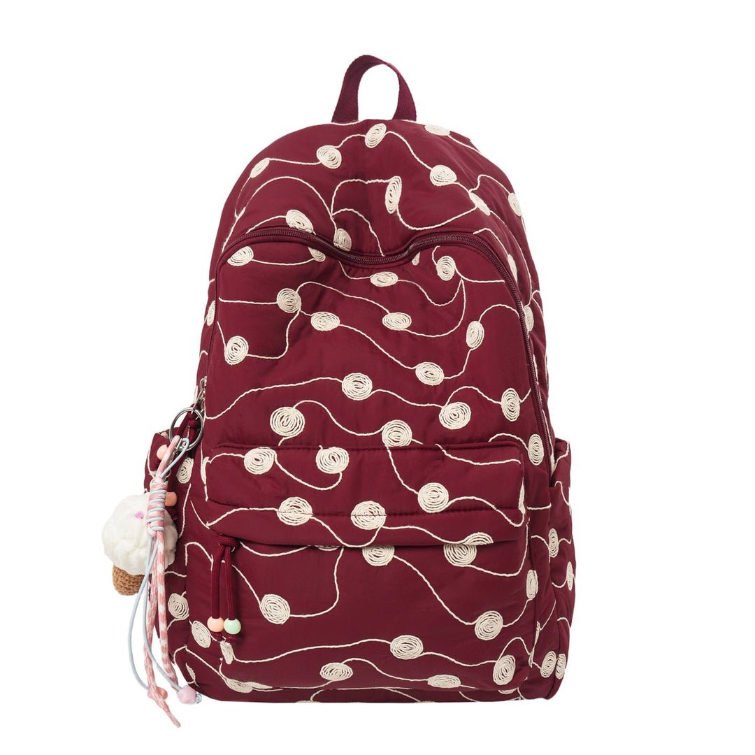 White quilted embroidered backpack for women, offering chic style and comfortable daily carrying.