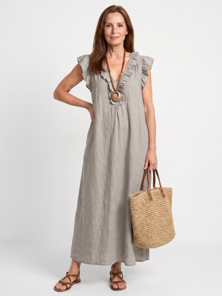 Chic women's midi dress, sleeveless, V-neck, delicate ruffle trim, versatile for day to night.