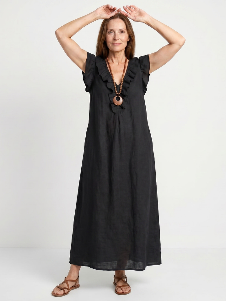 Women's V-neck midi dress, sleeveless, with chic ruffle trim; great for effortless style.