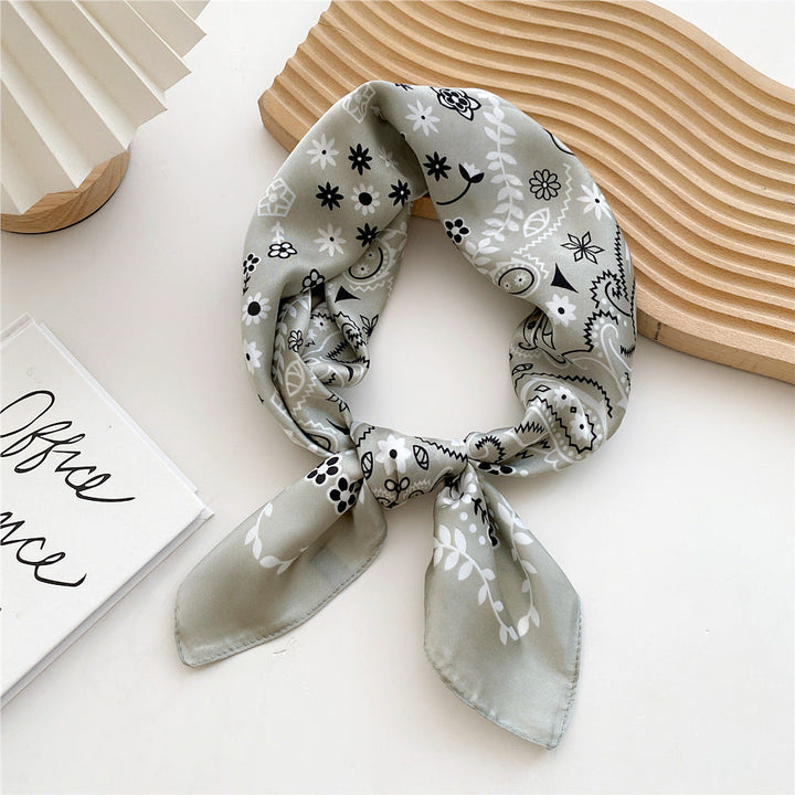 Luxurious satin leopard print square scarf for women. Enhance your fashion look.