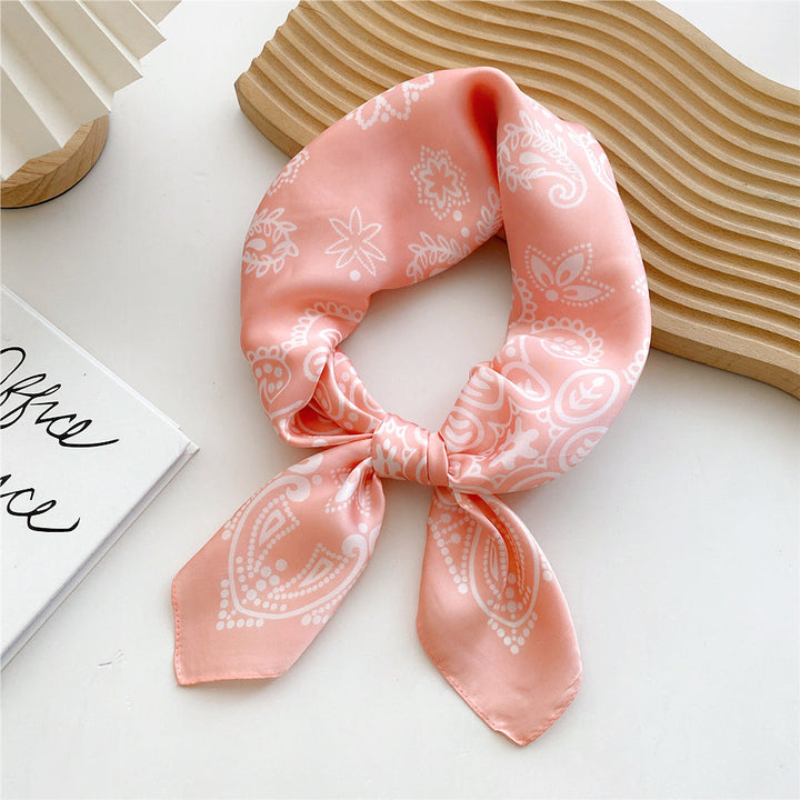 Women's animal print satin accessory, perfect as a chic headwrap or neck scarf.