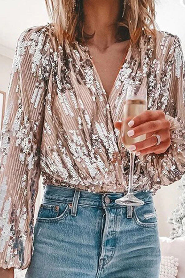 Stylish silver women's blouse. Fashionable shimmer top, a chic and elegant ladies' top for any event.