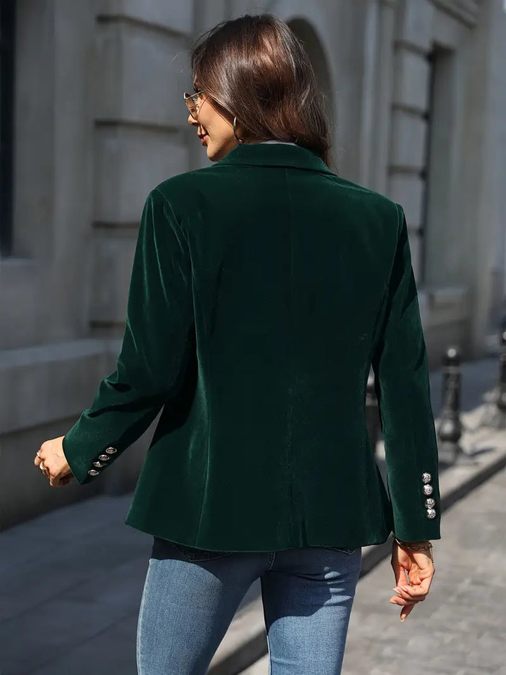 Elevated women's single button blazer, chic and tailored for business and high-fashion looks.