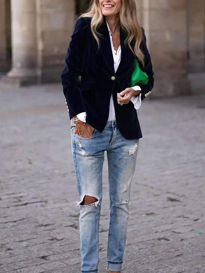 Professional women's single button tailored jacket, perfect for meetings and formal occasions.