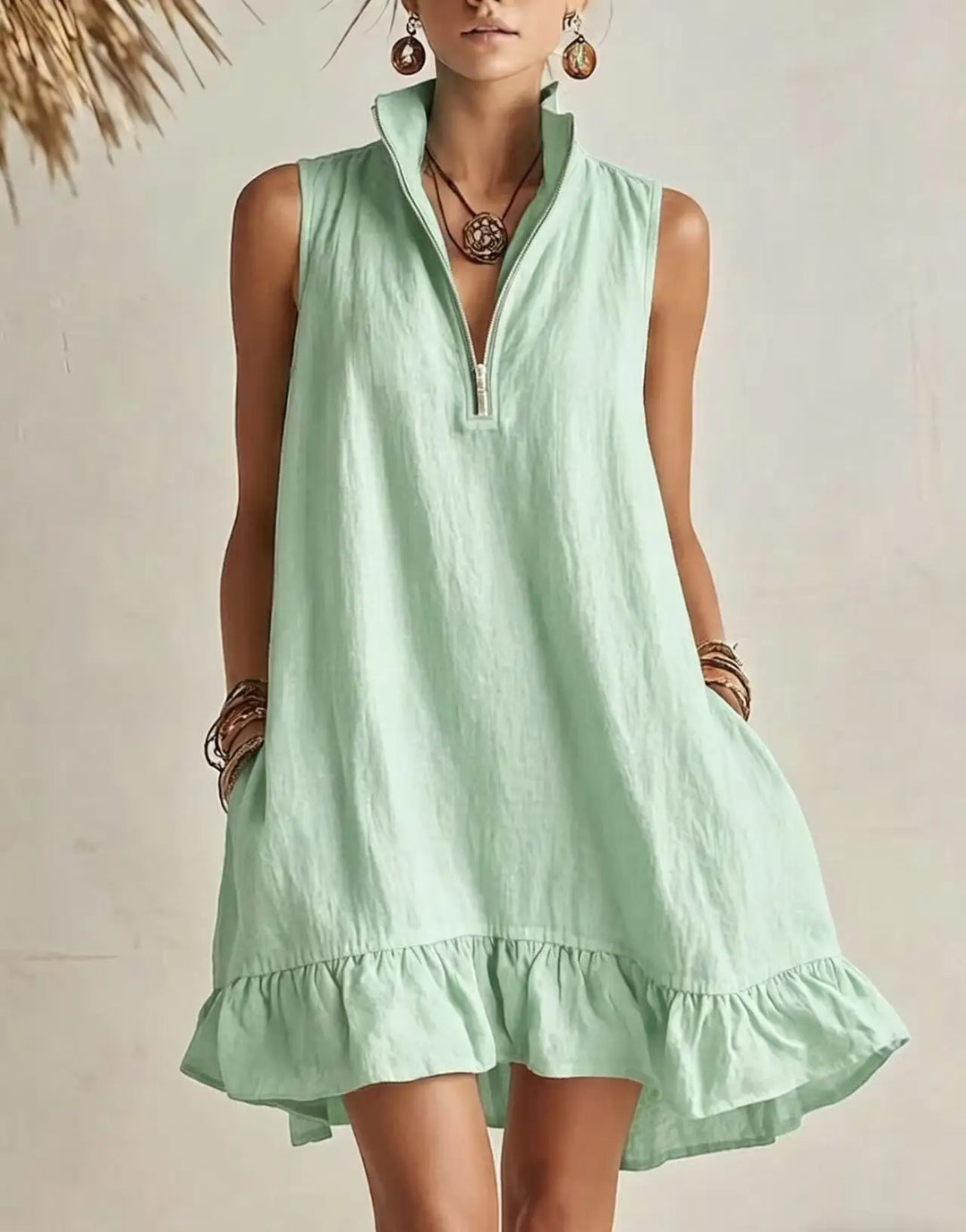 Chic women's sleeveless half-zip mini dress with ruffles. Perfect for summer casual or vacation. Available in green, khaki.