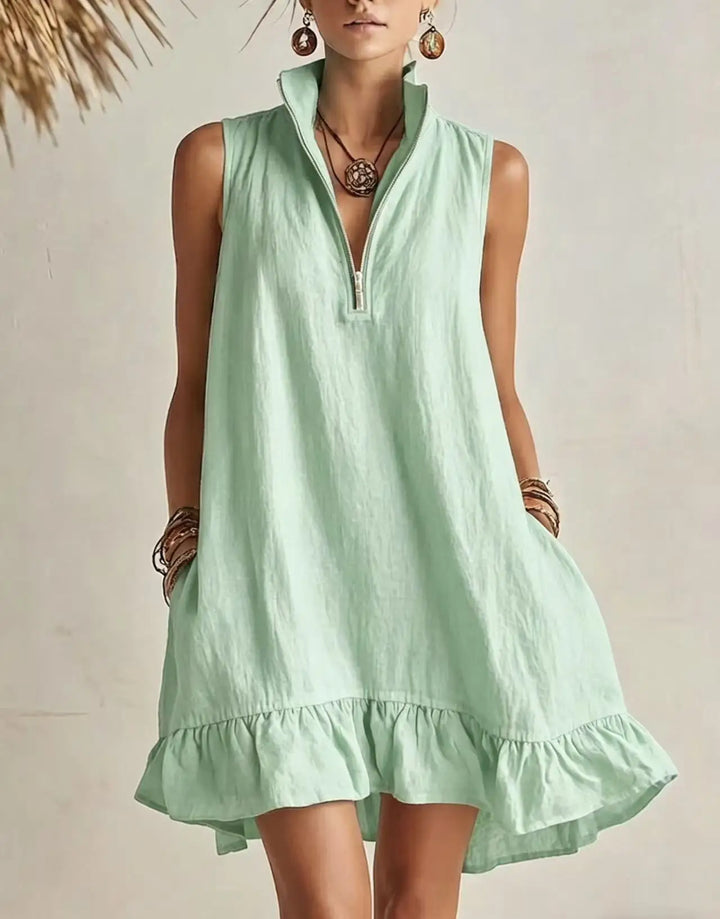 Chic women's sleeveless half-zip mini dress with ruffles. Perfect for summer casual or vacation. Available in green, khaki.