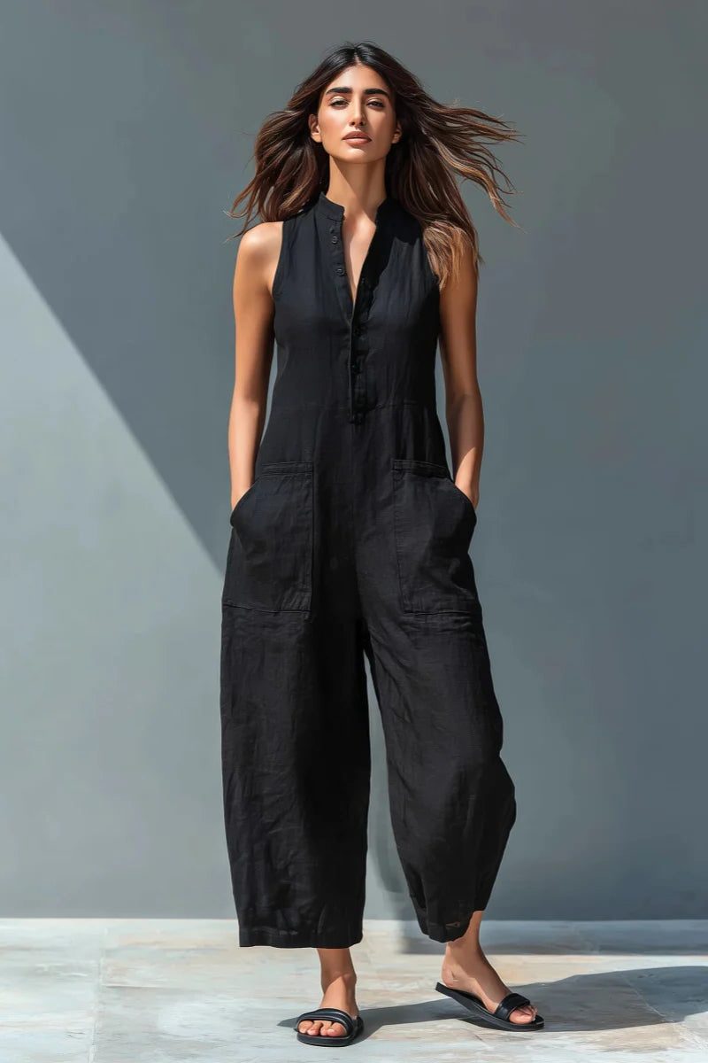 Chic women's sleeveless jumpsuit with stand collar, wide leg, & relaxed fit. Ideal for summer casual wear.