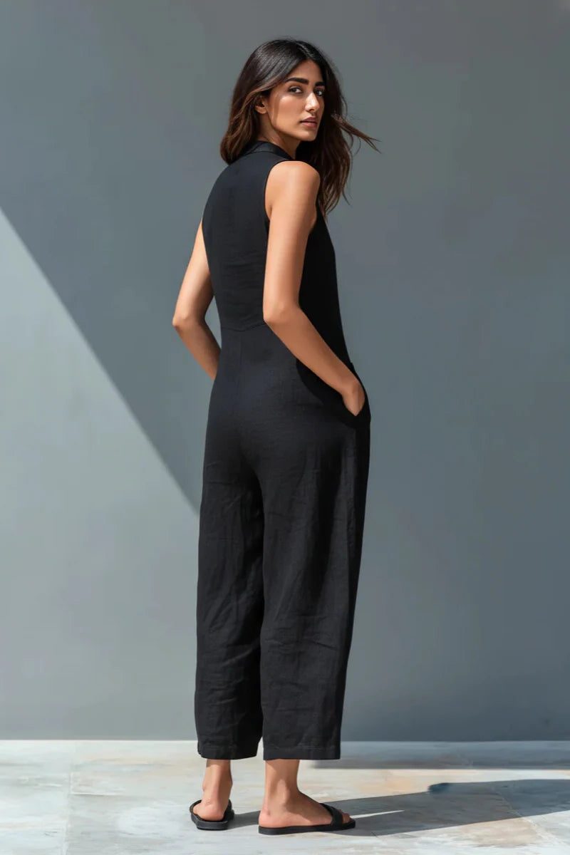 Stylish women's sleeveless wide-leg jumpsuit with pockets & stand collar. Perfect for spring everyday wear.